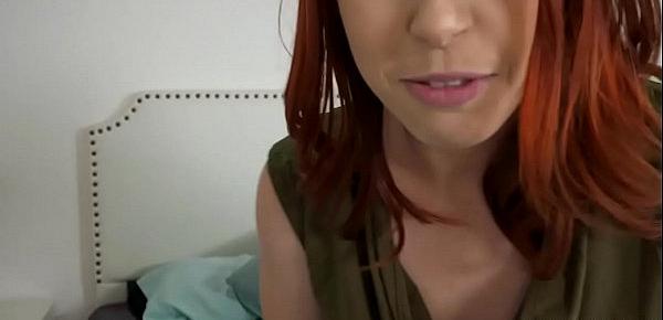  Hot redhead MILF Edyn Blair rubs her clit and her stepson saw her. She gave him a nice blowjob and swallows his cock to satisfy her  sexual cravings.